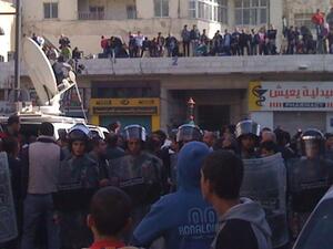 Jordanians flood the downtown of Amman to protest peacefully for the King to listen
