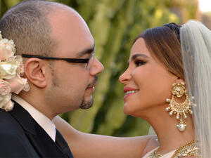 The happy couple: Waleed Mustafa and Carole Samaha on their wedding day. (Image: Facebook)
