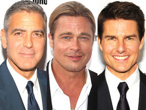 Silicon figures of George Clooney, Brad Pitt, and Tom Cruise surround the tables of "Taste of Fame" in Dubai (Image courtesy of UK eonline.com)