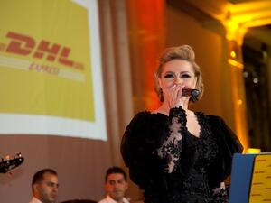 Diana Karazon sings for Jordan and DHL