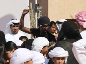 Director Abdul Aziz Ahmad on the set of the music video for the 2012 UAE National Day song, "Ya Khalifatna", at Abu Dhabi Heritage Village on the Corniche breakwater.
