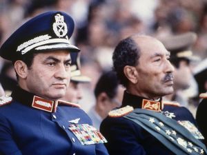 Behind these two former Egyptian presidents were two very public first ladies. (Image source: "newshopper.sulekha.com") Behind these two former Egyptian presidents were two very public first ladies. (Image source: "newshopper.sulekha.com")