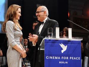 Mohamed ElBaradei and Angelina Jolie at the The Cinema of Peace Gala, where the famous kiss occurred. Mohamed ElBaradei and Angelina Jolie at the The Cinema of Peace Gala, where the famous kiss occurred.