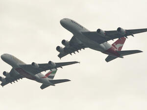 To celebrate the link-up, Emirates and Qantas staged a tandem flyover of the Sydney Harbour Bridge by two Airbus A380s. (JAMES MORGAN / QANTAS / AFP) To celebrate the link-up, Emirates and Qantas staged a tandem flyover of the Sydney Harbour Bridge by two Airbus A380s. (JAMES MORGAN / QANTAS / AFP)