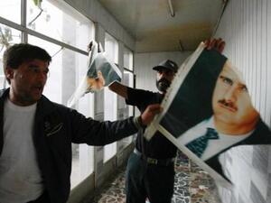 Celebration time for the rebel fighters as they get missiles for the first time