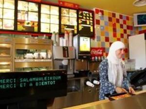 A woman at work in a fast food chain