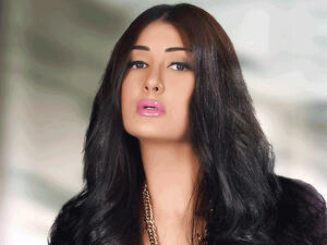 An angry Ghada threatened those impersonating her on Twitter. (Image: Alqabas.com)