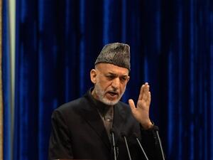 The top U.S. military commander stationed in Afghanistan apologised personally to Afghan President Hamid Karzai for a drone strike that caused dozens of civilian casualties, including the death of a 2-year-old child. (AFP)