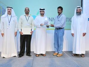 DUBAL receiving the awards