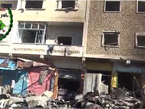 A shot of the damage in the popular Darkoush market shortly after the car bomb exploded. (YouTube/MiddleEastBrk)