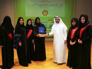 Omar Al Qurashi, Director of Communications at Shell with winners of BEA Award