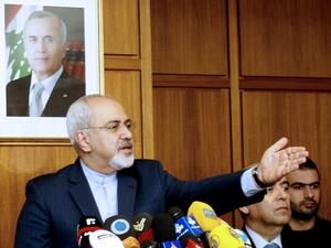Iranian Minister of Foreign Affairs Mohammad Javad Zarif speaks to journalists at Rafic Hariri International airport in Beirut on January 12, 2014 upon his arrival for a one day visit to Lebanon to meet Lebanese officials. Iran and Lebanon are looking to boost their bilateral ties. (AFP)
