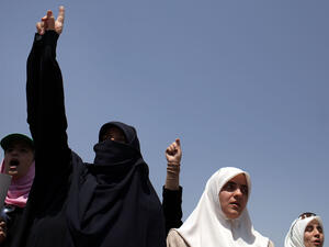 Jordanian mothers and women's rights supporters are not backing out from their rights to pass their nationality to their children. Jordanian mothers and women's rights supporters are not backing out from their rights to pass their nationality to their children.