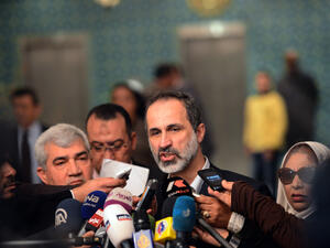 Ahmed Moaz al-Khatib, President of the National Coalition for Syrian Revolutionary and Opposition Forces, talks to the press following his meeting with Arab League Secretary General Nabil al-Arabi. (AFP)