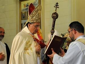 Maronite Patriarch Beshara Rai (C) conducts a service at the Maronite Cathedral of Saint Anthony (Mar Antonios) in Bab Tuma, a predominantly Christian quarter of Damascus, on February 9, 2013. (AFP PHOTO / STR)
