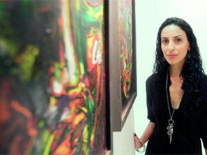 Lina Ogaili studied at Britain's University of Kingston, and she is a member of the Emirates Society for Fine Arts in the UAE.