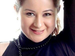 Like father like daughter: Mai Nour El Sherif poses with Nour El Sherif