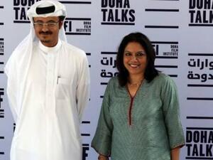 Indian film director of "The Reluctant Fundamentalist" Mira Nair stands along side Abdul Aziz Al Khater, the Chief Executive Officer of the Doha Tribeca Film Festival in the Qatari capital, on November 17, 2012.