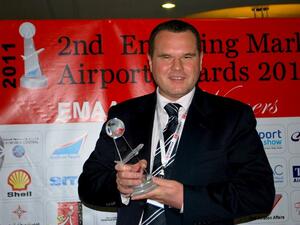 Juergen Strommer, Cavotec Managing Director and Regional Manager for Middle East and India holding the award