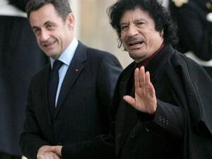 Nocolas Sarkozy cozies up with the late Gaddafi Nocolas Sarkozy cozies up with the late Gaddafi