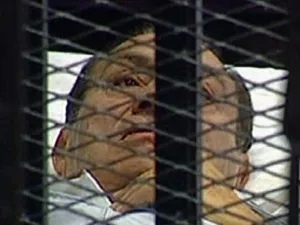 Speculation had arisen over whether the Pharaoh himself, Mubarak, would be in attendance at his own trial: He came in earlier today on a stretcher, and stayed in the 'docks' that way in his invalid condition.