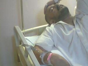Mutaz Abu Rmeileh chained to his hospital bed