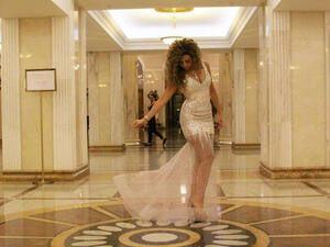 The beautiful Swarovski dress Myms wore in Russia. (Image: Facebook)