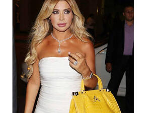 Nawal Al Zoghbi sportin' the new handbag.