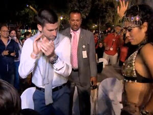Novak giving belly dancing a try in Dubai. (Image: Youtube screenshot)