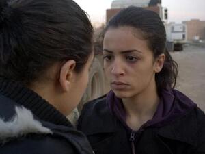 A still photo from "On the Edge"