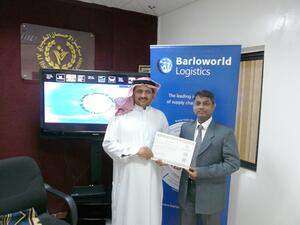 Barloworld Logistics Marketing & Communications Head, Sanjay More, receiving acknowledgement from Abdullah Aljaadi of Al Ihsan Charity Center, Ajman