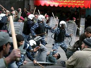 Palestinian police fight protesters in Ramallah. (AFP/File)