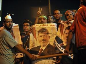 Supporters of ousted president Mohamed Morsi protest in Cairo on July 30, 2013 (AFP)