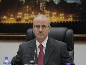 Rami Hamdallah, the prime minister of the Palestinian Authority, was stopped at a Ramallah checkpoint by Israelis on Tuesday. (AFP/File)