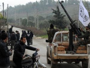 مقاتلون من المعارضة في جسر الشغور/أ.ف.ب