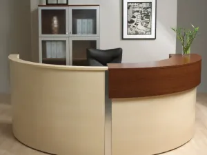 The receptionist was caught off-guard when the offer of coffee turned into an unwanted hug that later resulted in a forceful kiss. (Image courtesy of "officefurnituredepot.com")