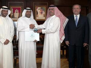 Ahmed Bin Shafar, CEO of Empower and Saeed Al Tayer, Chairman of Empower, shaking hands during the board meeting