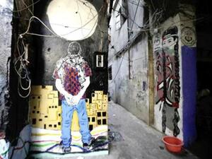 The murals cover 2,000 square feet of the walls in Shatila Mosque Square.