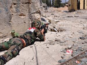 Syrian rebels and regime fighters signed a truce in Damascus on Sunday. (AFP/File)