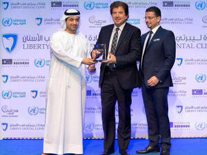 UNRWA honors Walid Tawfiq with a plaque. (Image: Facebook)