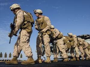 US Marines pivot into position during an exercise on the flight deck of the USS San Antonio in the Mediterranean. Abu Anas al Libi was allegedly interrogated on this ship sailing off the Libyan coast following his abduction on October 6, 2013 by US special forces in Tripoli. (AFP)