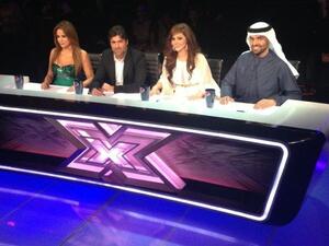 Cat fights on the judging panel on X Factor's live rounds. 