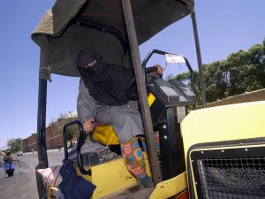 How will their non-too pleased male counterparts react to lady drivers sweeping the Kingdom? Will they urge the Kingdom's
men to beat their wives back to the passenger seat where they belong? In Afghanistan (shown above) women started driving
for practical work reasons after Taliban retreat.