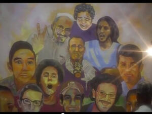 Screengrab of Al Masry showing a painting of the faces of several martyrs of the revolution