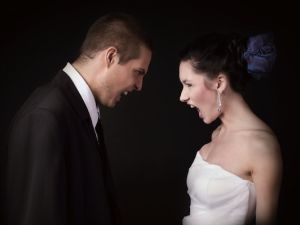 Two awkward wedding parties! A Saudi woman demanded to be re-married in a venue next to where her ex-husband is to marry one of her relatives. (Angry bride/cellistka/Shutterstock)