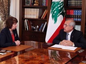 سليمان خلال لقائه مع كاثرين اشتون