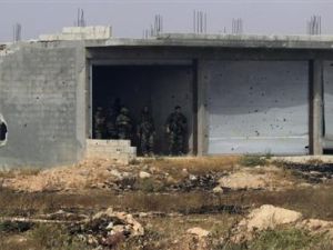 جنود من القوات النظامية في القصير