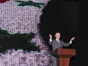 الرئيس السوري بشار الاسد خلال القائه خطابه الاحد