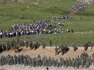 فوات من الجيش الاسرائيلي في مواجهة متظاهرين في مسيرة العودة في ايار الماضي