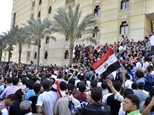 Students protest outside Azhar University. (AFP/File)